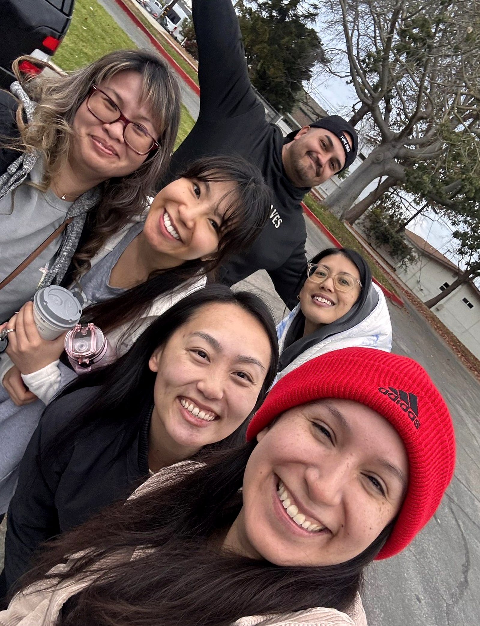 A group selfie of smiling friends